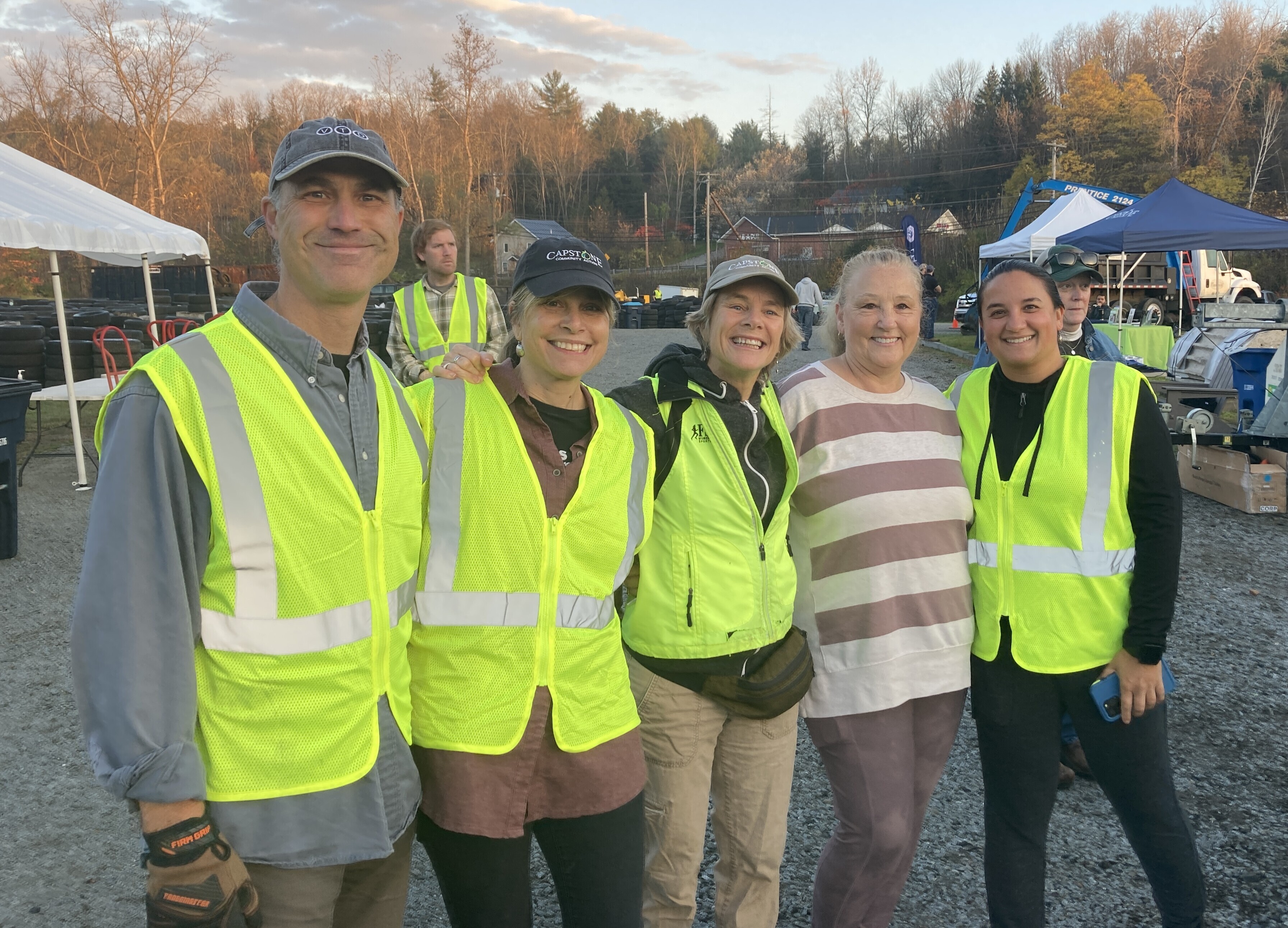 Group of smiling Capstone volunteers at Wheels for Warmth in 2023