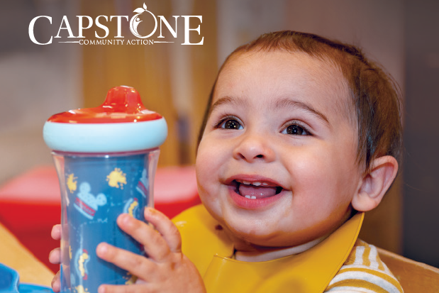 Cover image of a young boy happily holding a cup